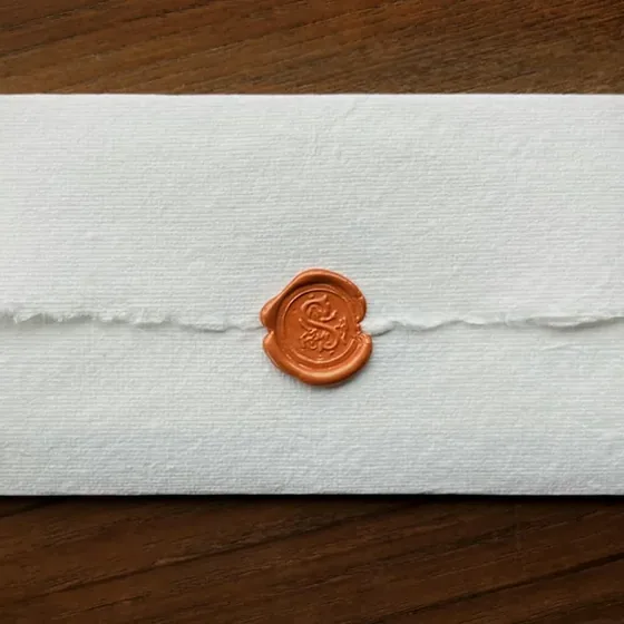 A wax-sealed envelope for confidential legal document courier service in Tampa